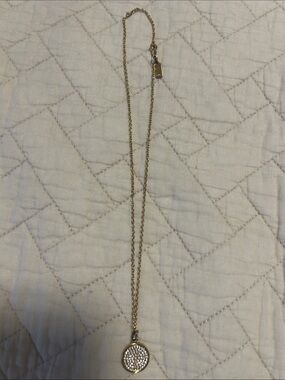 Coach Gold-Tone Crystal Disc Pendant Necklace